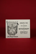 Advertisement for the Museum of Witchcraft in Boscastle, North Cornwall on a red background.