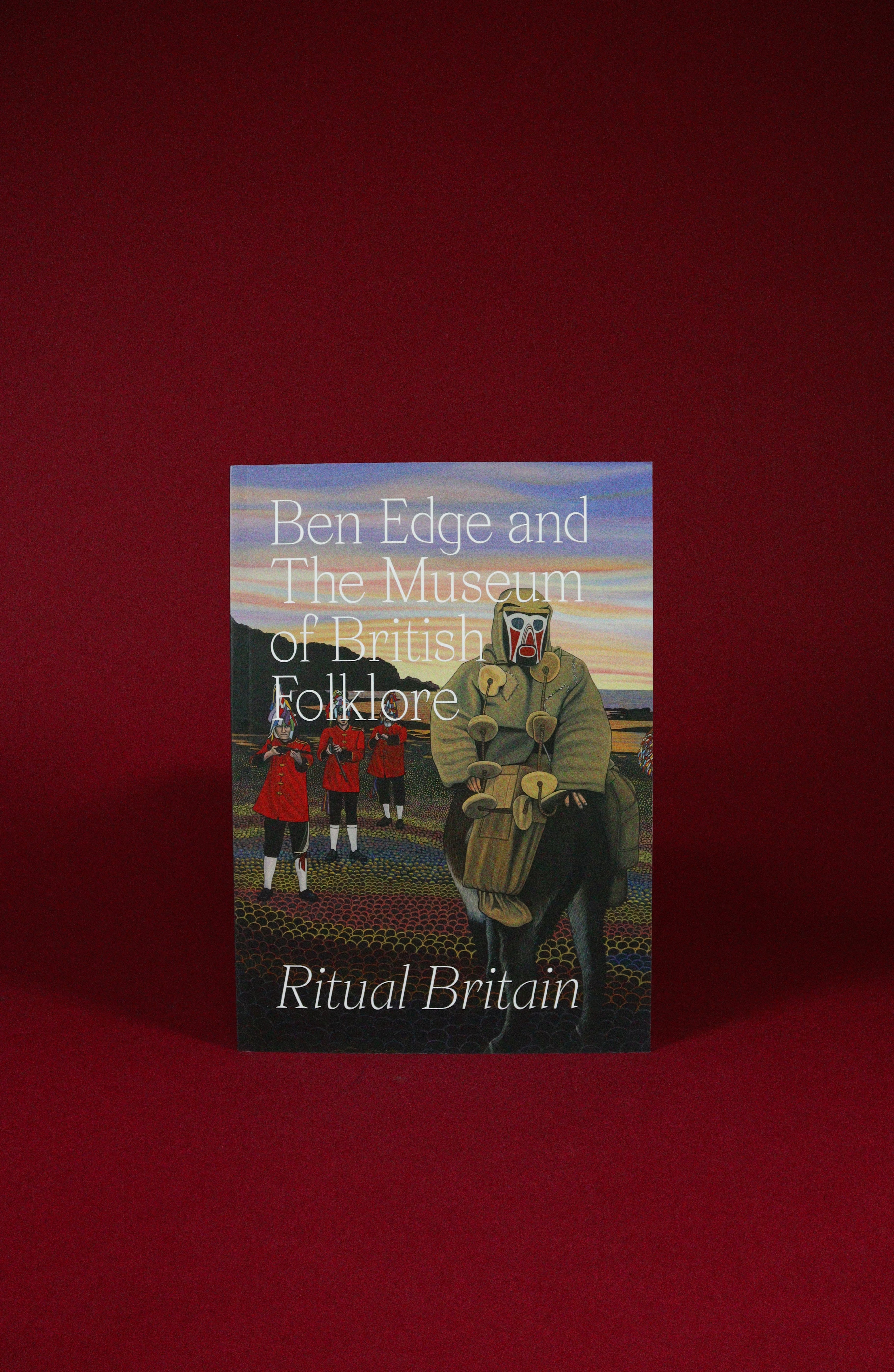 Book cover of 'Ritual Britain' by Ben Edge and The Museum of British Folklore on a red background