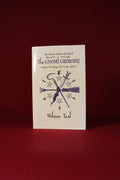 Book titled 'The Gnome Grimoire' by Wilmar Taal on a red background
