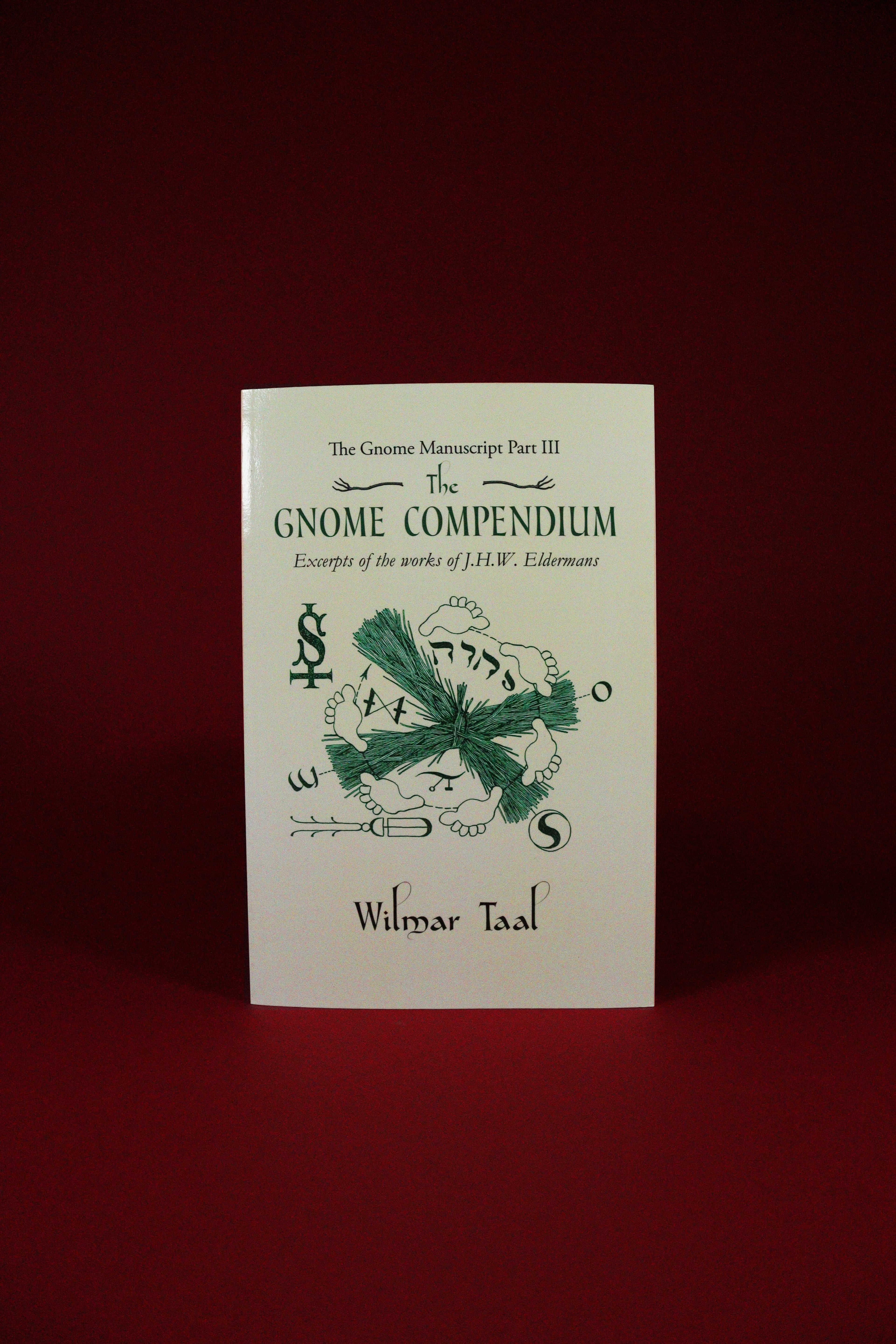 Book titled 'The Gnome Compendium' on a red background