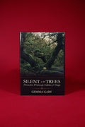 Book titled 'Silent as the Trees' by Gemma Gary on a red background