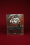Book titled 'Gothic Fashion: The History' on a red background