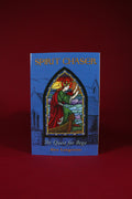 Book titled 'Spirit Chaser: The Quest for Bega' with a stained glass window design on a red background