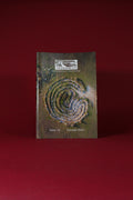 Magazine cover with a labyrinth design on a red background