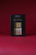 Book titled 'Dew of Heaven: Objects of Ritual Magic' on a red background